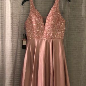 blush pink prom dress, with tags still attached.